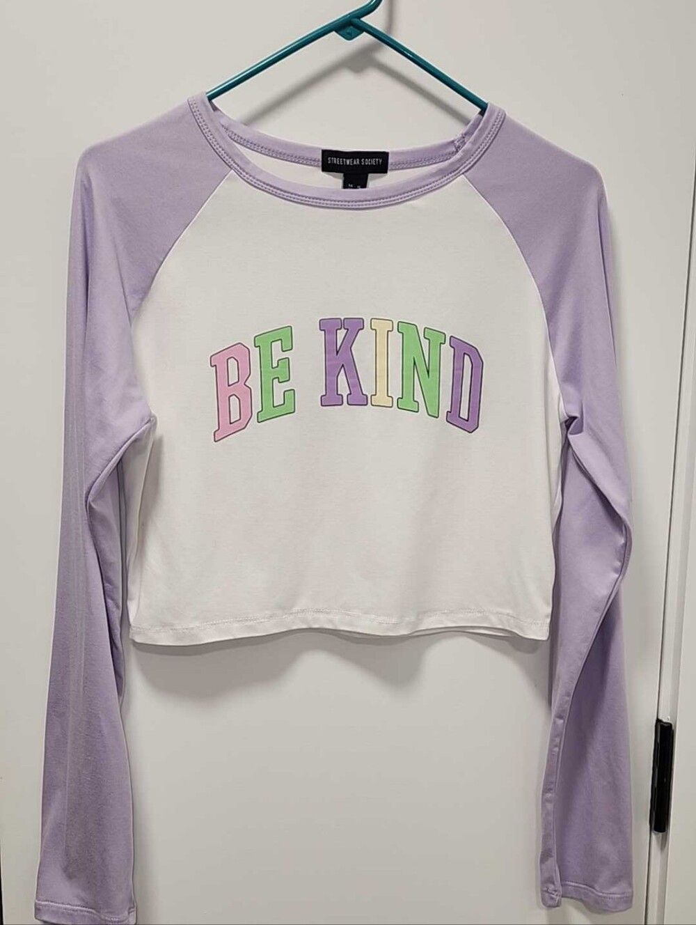 Streetwear Society Lavender & White 'BE KIND' Cropped Raglan Long Sleeve Tee